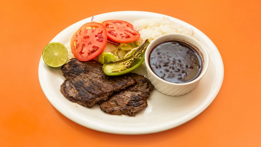 Carne Asada with rice, beans and salad